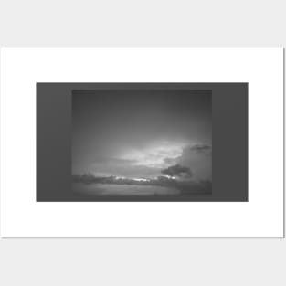 Grey white cloudscape with dark distinctive cloud shapes. Posters and Art